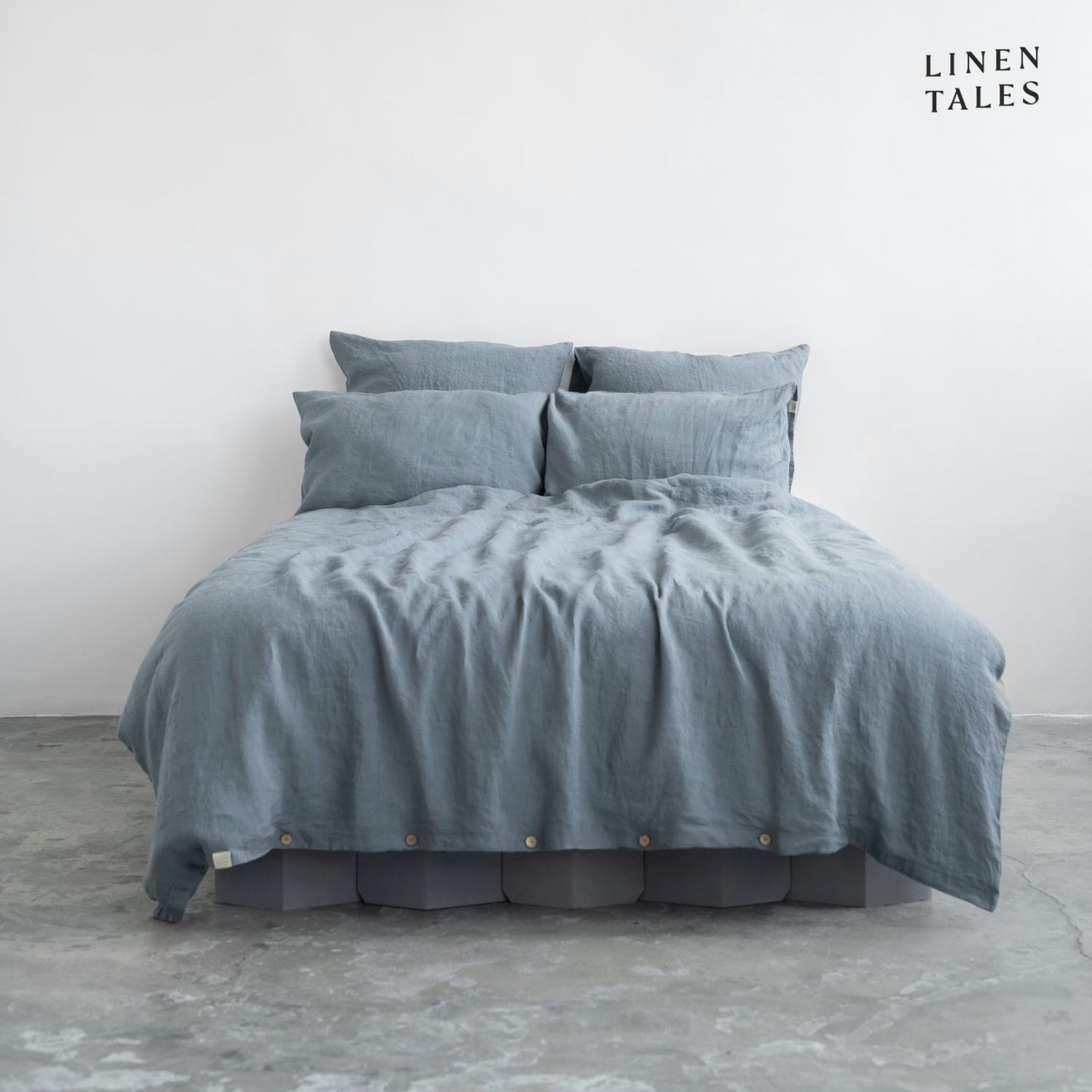 Premium Blue Fog linen duvet set with matching pillowcases, elegantly styled for a soft and breathable sleep experience.