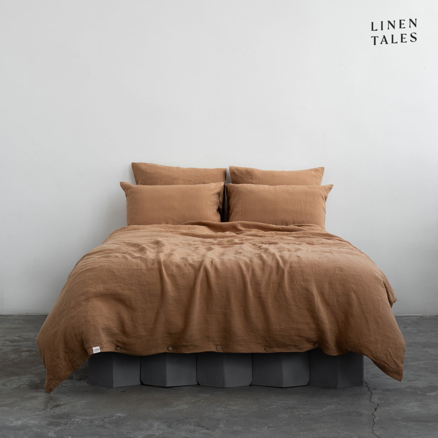 Premium Camel linen duvet set with matching pillowcases, elegantly styled for a soft and breathable sleep experience.