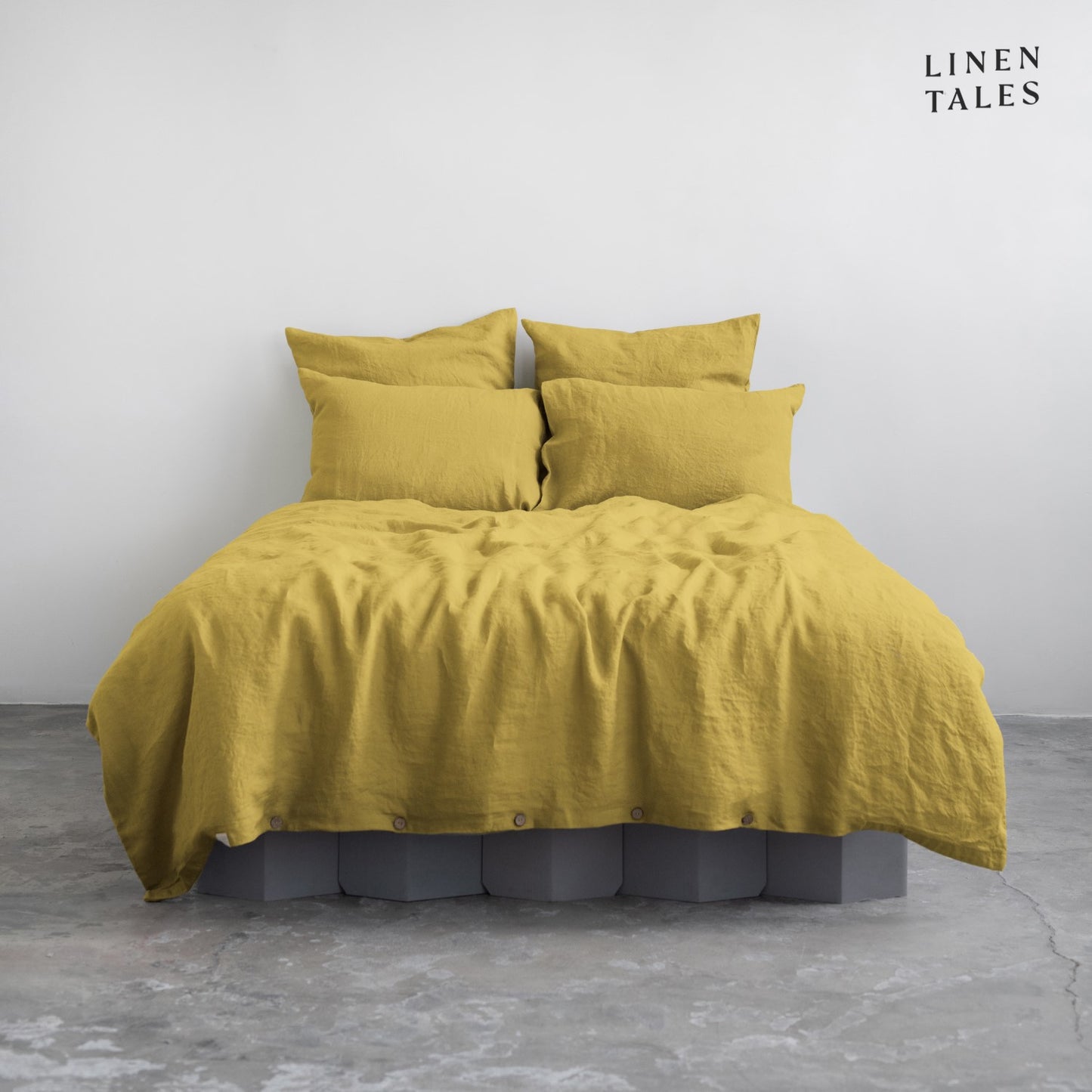 Premium Lemon Curry linen duvet set with matching pillowcases, elegantly styled for a soft and breathable sleep experience.