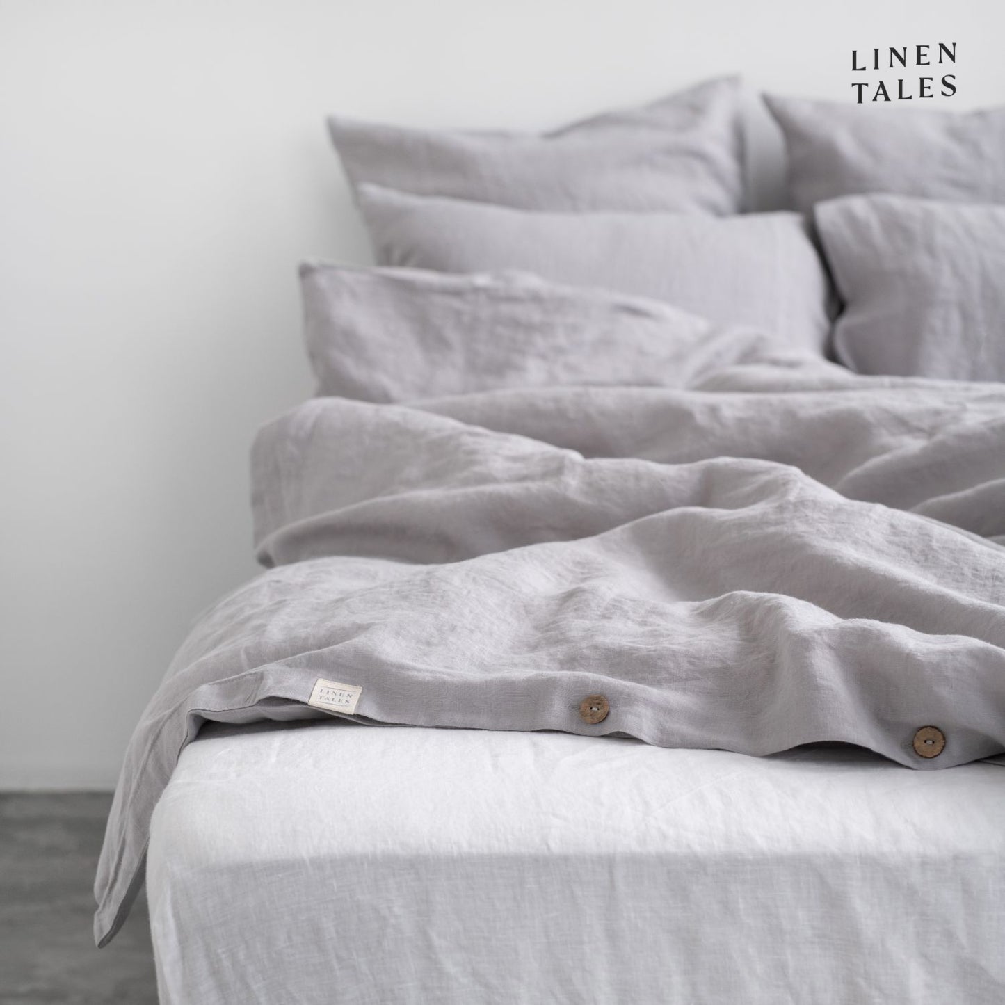 Layered look of Light Grey linen duvet set with coordinating sheet, offering effortless comfort and timeless style.
