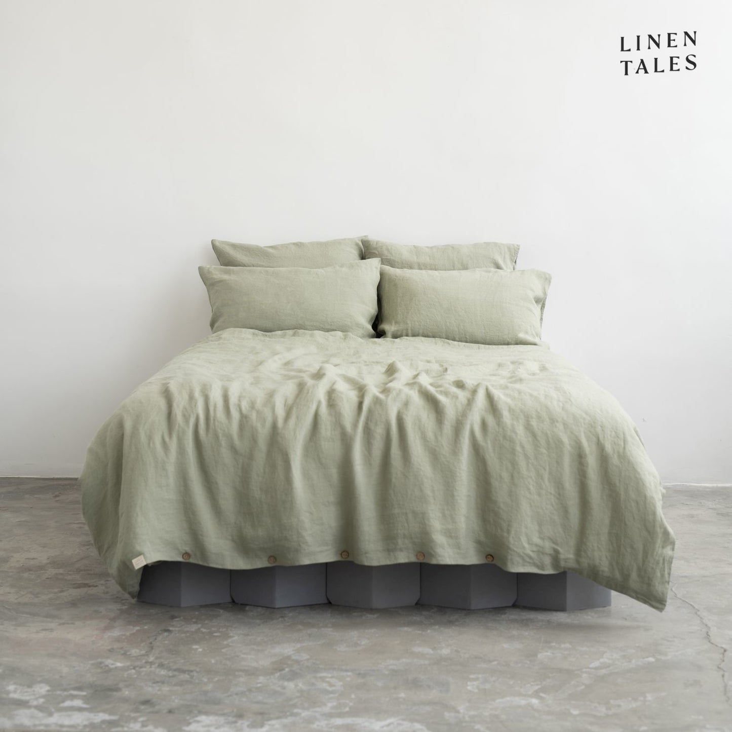 Premium Sage linen duvet set with matching pillowcases, elegantly styled for a soft and breathable sleep experience.