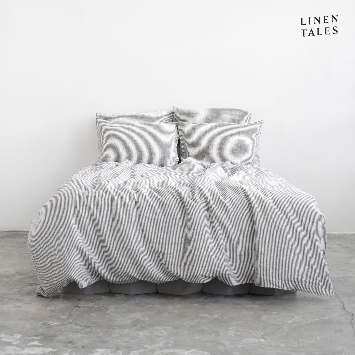 Premium Thin Black Stripes linen duvet set with matching pillowcases, elegantly styled for a soft and breathable sleep experience.