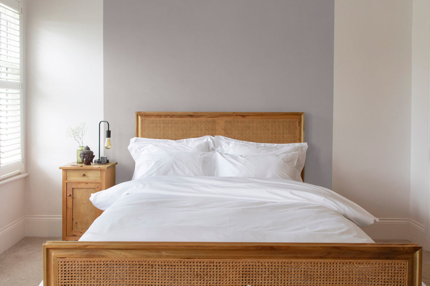 Contemporary Bedroom with wooden bed frame, white linen bay GOTS certified 100% cotton bedding, duvet cover and nightstand.