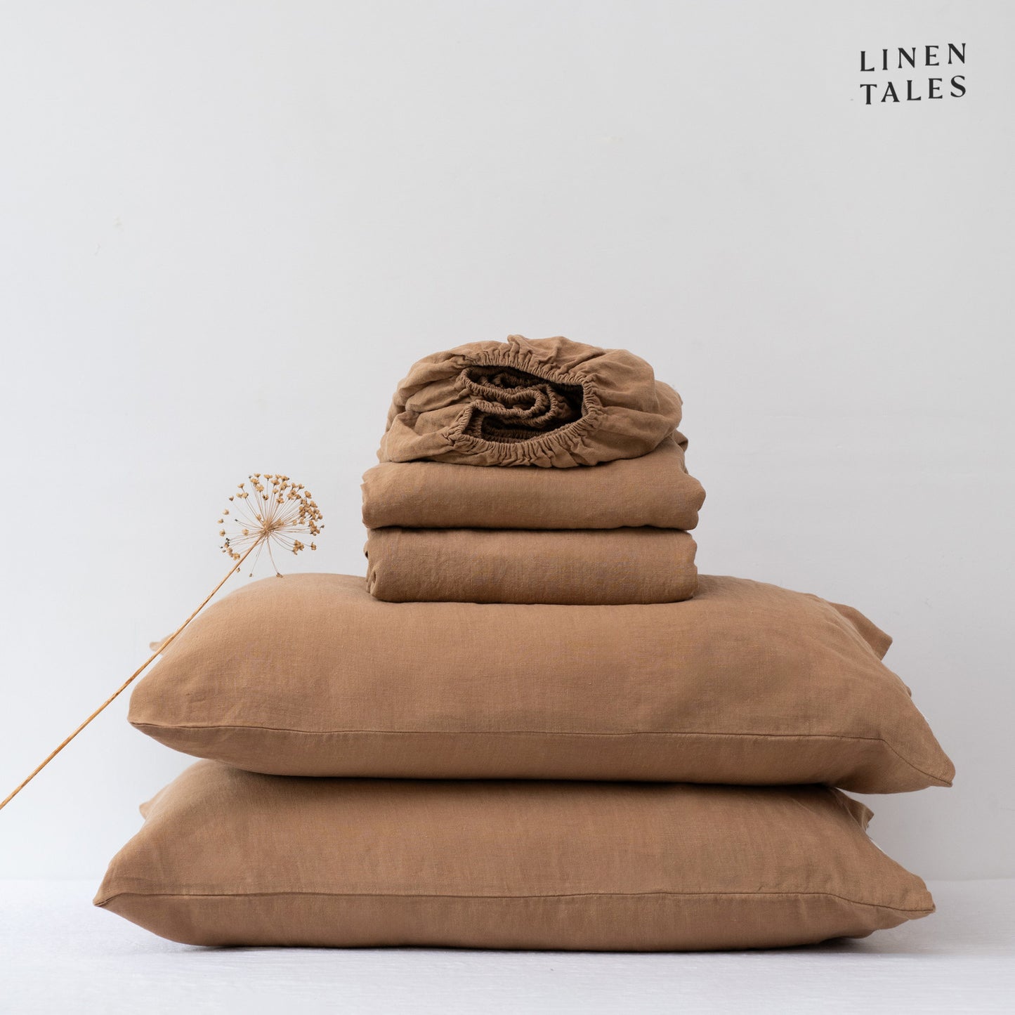 Pure European Linen Sheet Set in Camel displayed on a neatly made bed – includes a flat sheet, fitted sheet, and matching pillowcase for effortless comfort.