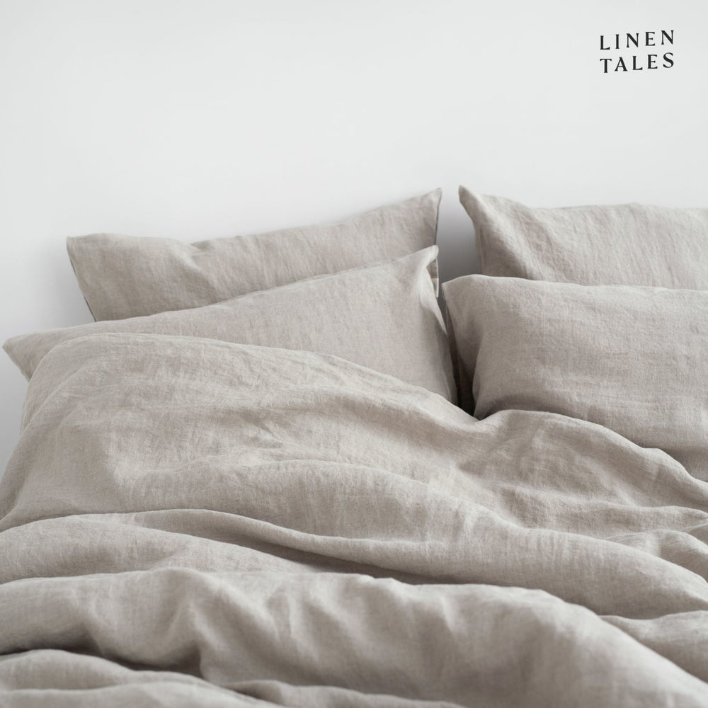 
                  
                    Textured close-up of Natural linen fabric, showcasing natural fibers, softness, and breathable weave.
                  
                