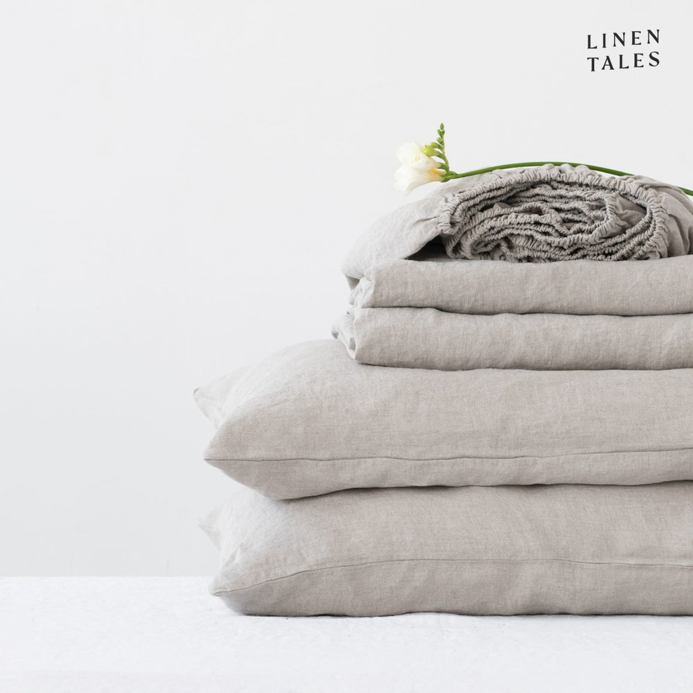 
                  
                    Minimalist bedroom featuring pure linen bed sheets in Natural with a matching pillowcase – refined simplicity meets luxurious softness
                  
                