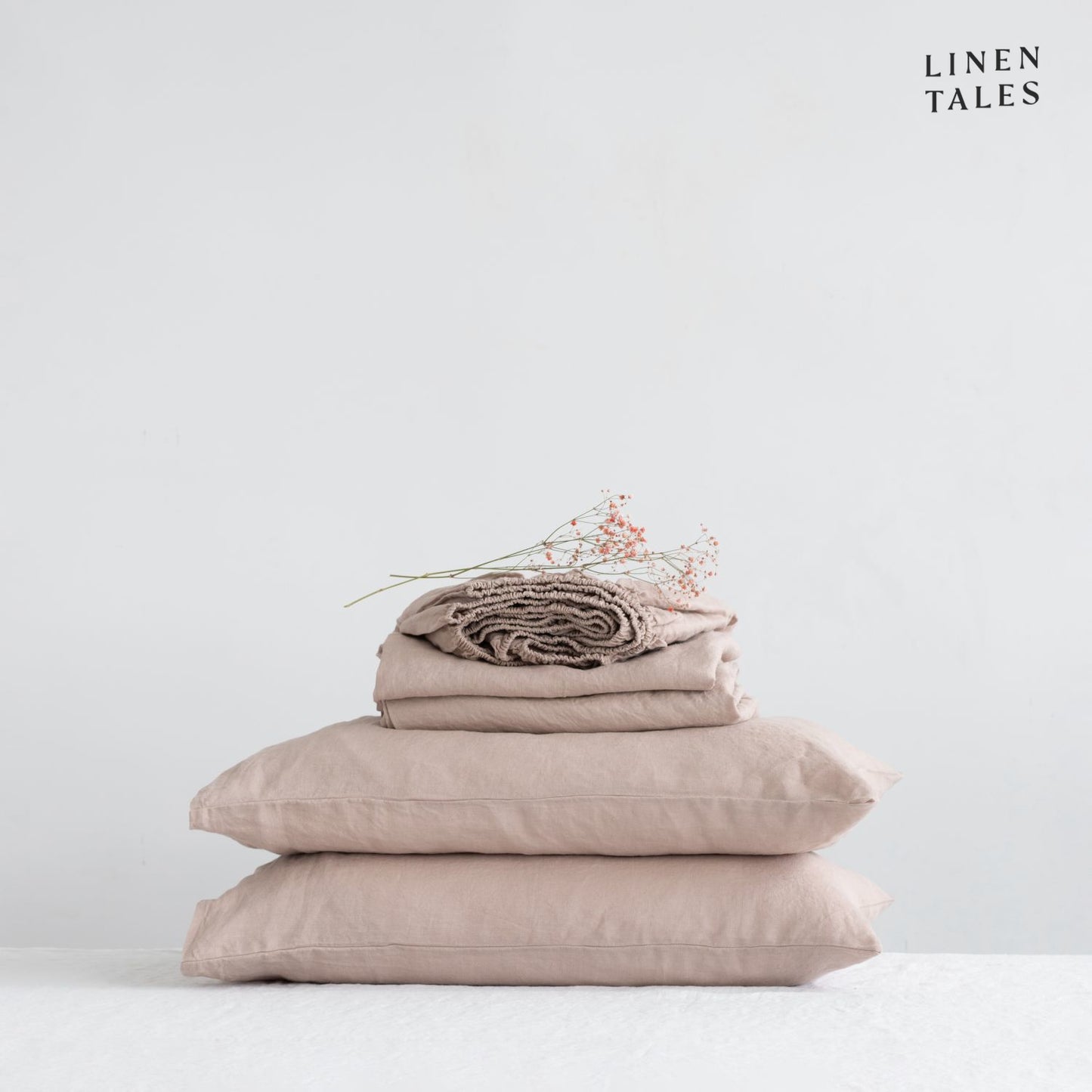 Pure European Linen Sheet Set in Portobello displayed on a neatly made bed – includes a flat sheet, fitted sheet, and matching pillowcase for effortless comfort.