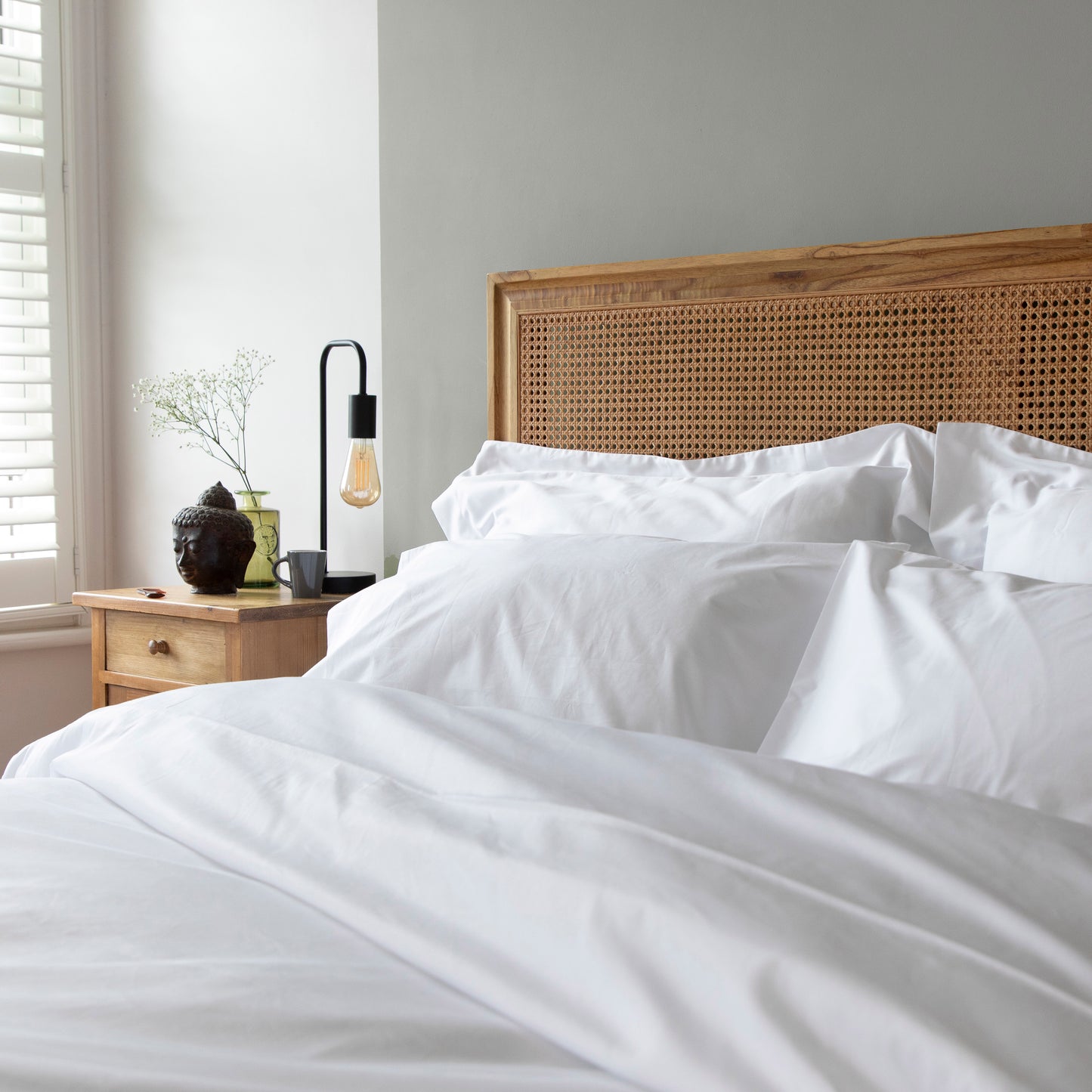 Sea Salt White 100% GOTS certified bedding set bed with a wooden headboard and white bedding